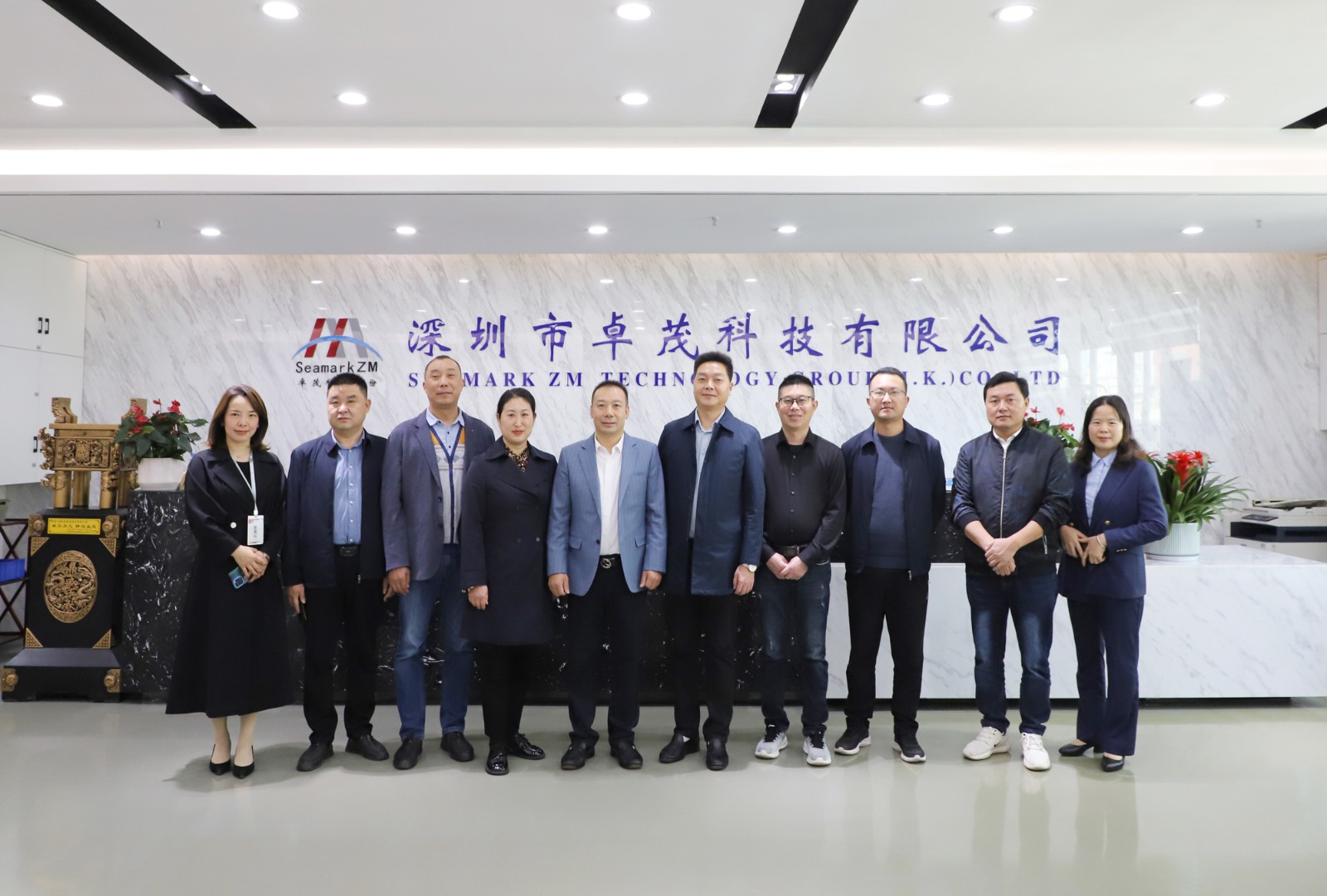 聞總與湖北省?？悼h政府副縣長龔夫一行合影.jpg